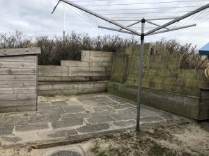 Buitenplaats achter het huis - waslijn - vakantiehuis Geluksplak - Hallo Terschelling