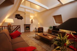 avond sfeer woonkamer vakantiehuis Geitenplak - Hallo Terschelling