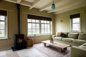Zithoek met houtkachel vakantiehuis Jansveld Formerum - Hallo Terschelling
