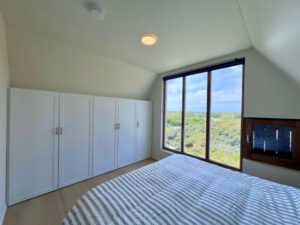 Vakantiehuis Geluksplak op Terschelling slaapkamer boven en kastruimte - Vakantiehuis huren op Terschelling - Hallo Terschelling